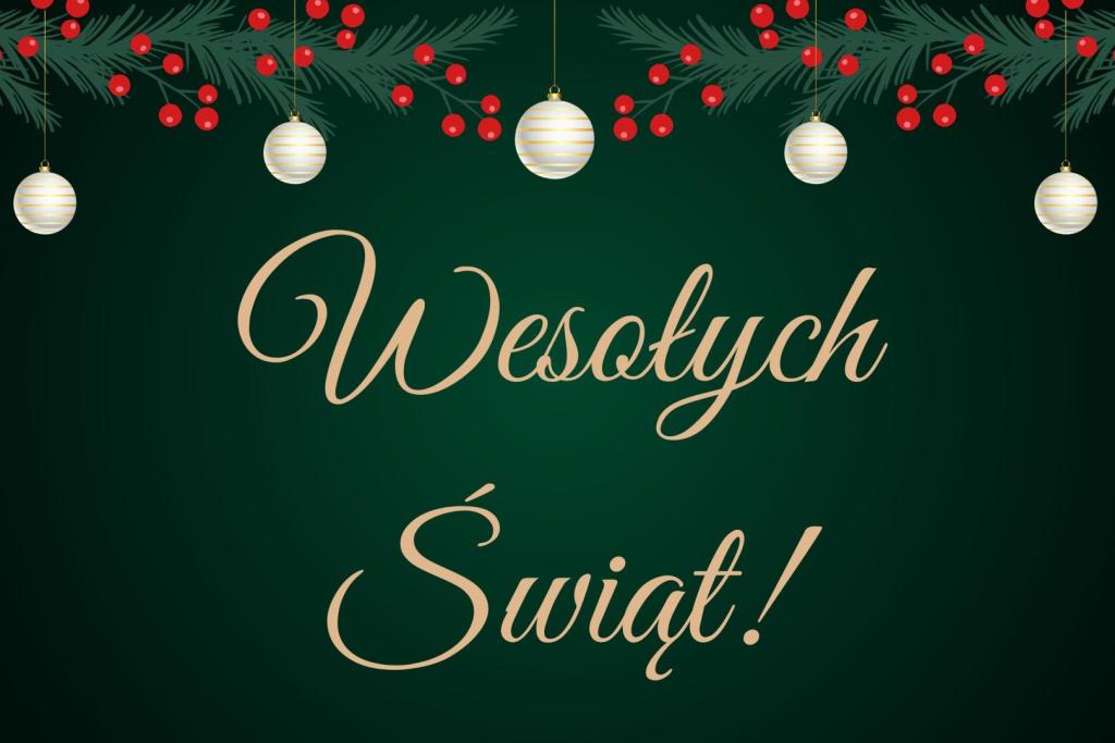 napis na wesołych świąt na zielonym tle